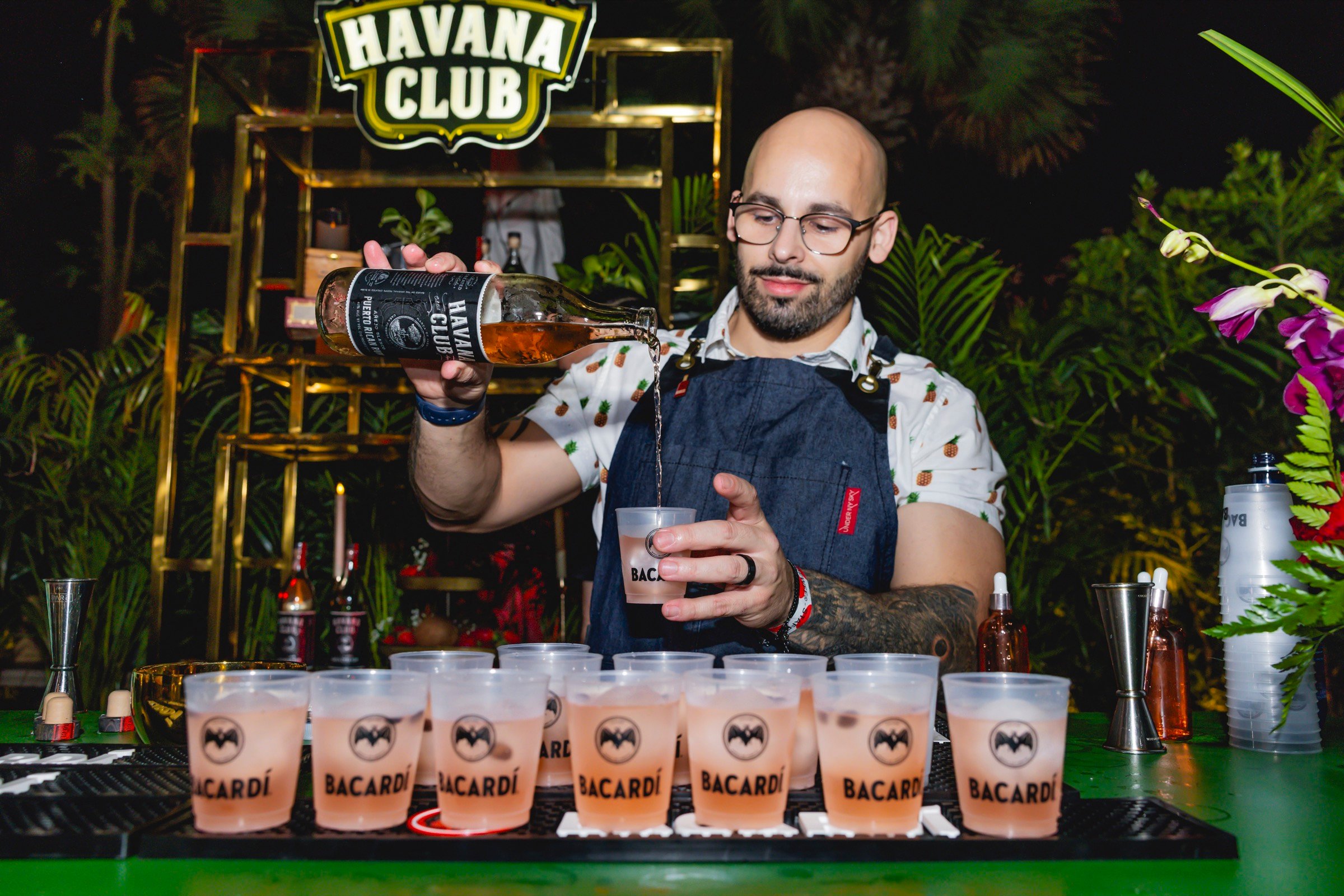 Bacardi bartender pouring cocktails at SOBEWFF