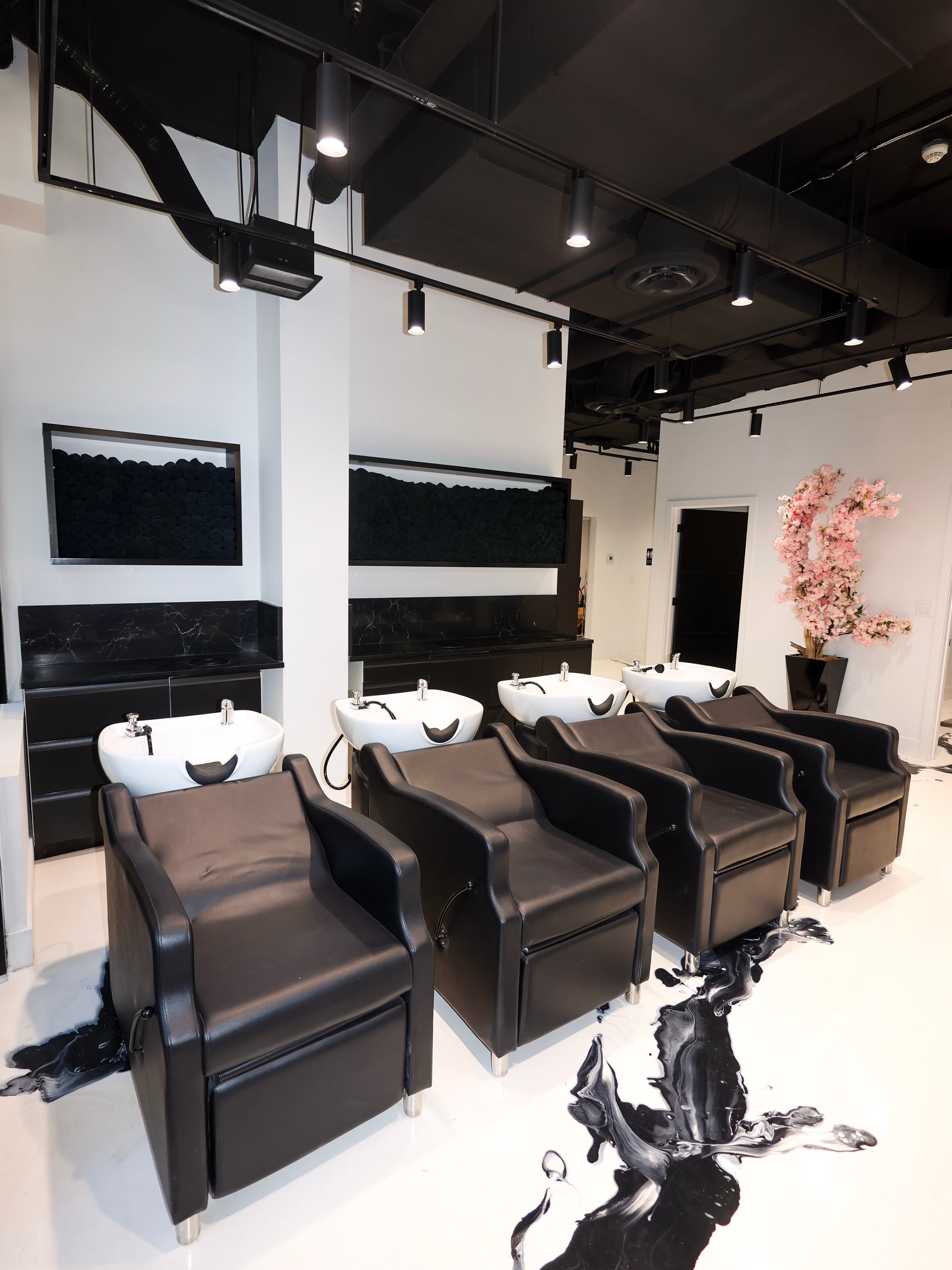 Wash stations at Neish Hair, designed with Japanese-inspired symmetry