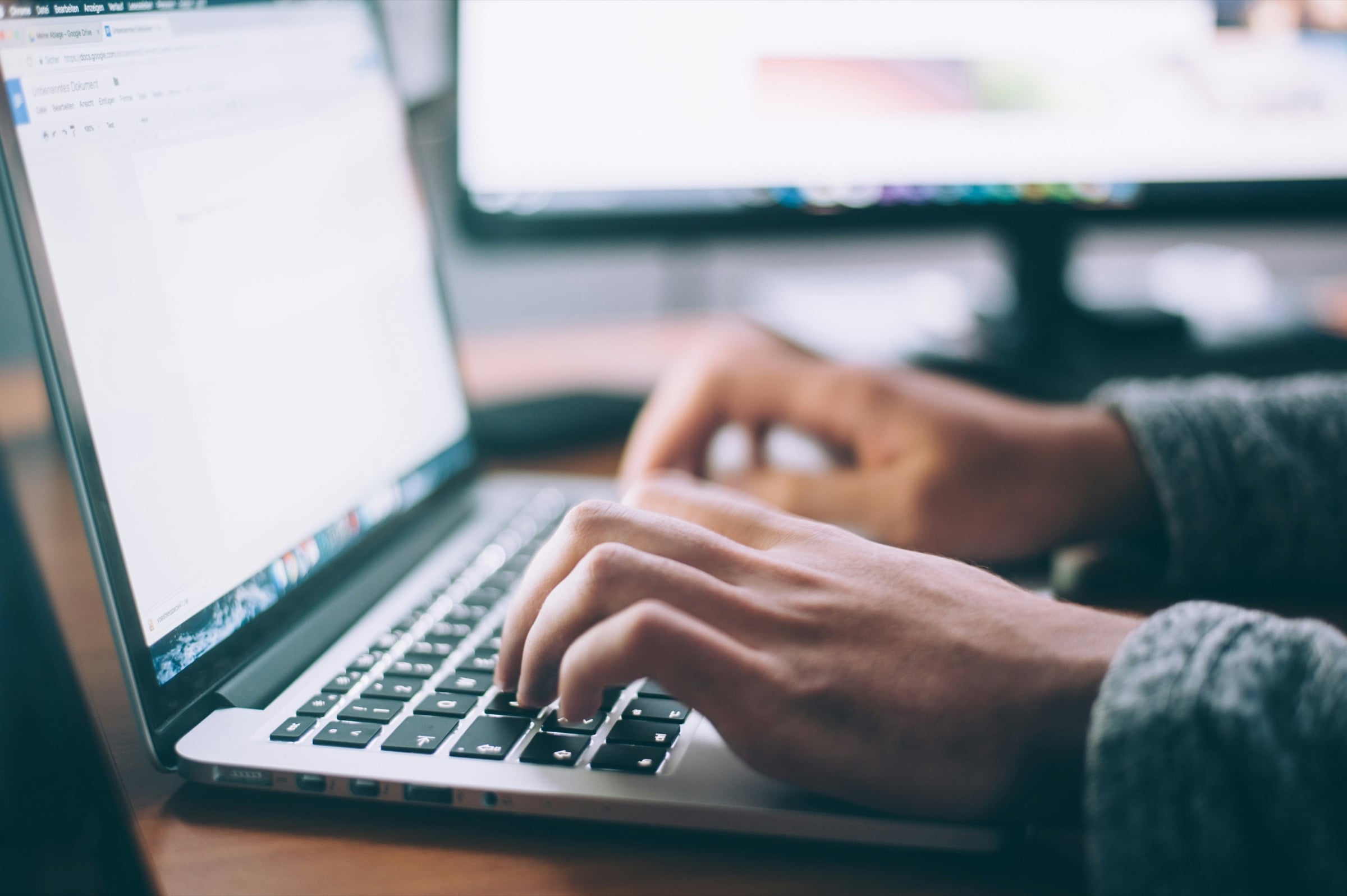 Person checking email on a laptop