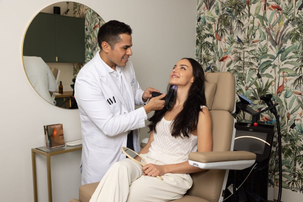 A provider performing a skin treatment on a patient at BODYWELLE in Miami Beach