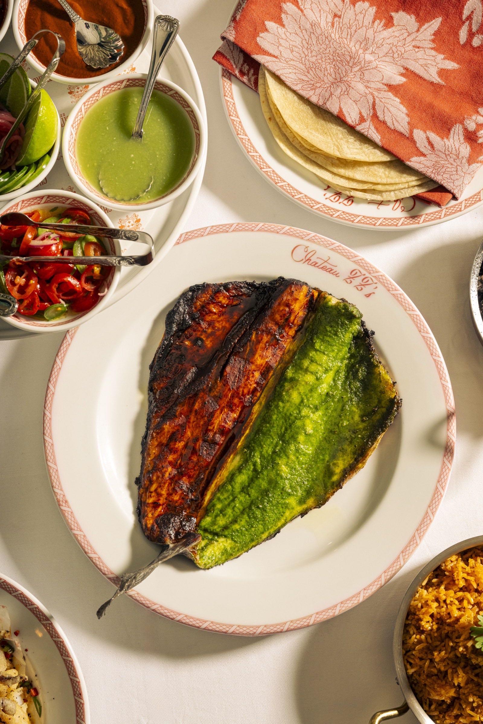 Whole branzino rojo y verde at Chateau ZZ’s