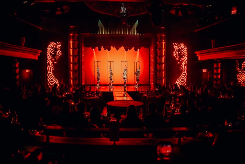 A performance on stage at Faena Theater in Miami Beach as diners watch from their tables