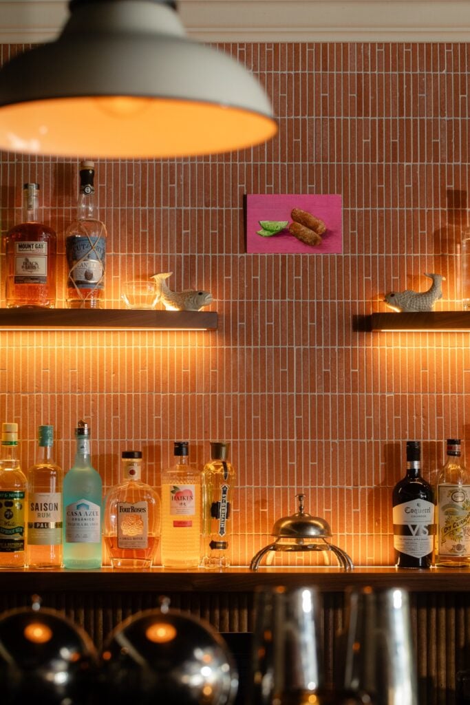 Bottles lit along the back bar at Stormy Monday in South Beach