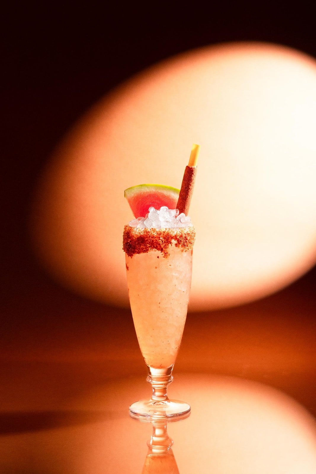 A Mama Tried cocktail served under warm bar lighting